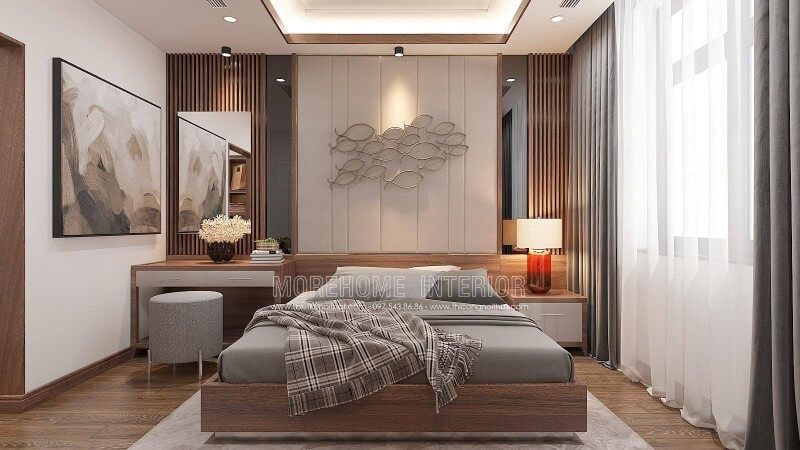 Để bố trí phòng ngủ cho cậu con trai mới lớn, lối thiết kế đơn giản nhưng có phần nam tính được chọn làm nền tảng. Giường ngủ hiện đại gỗ công nghiệp veneer óc chó là điểm nhấn nổi bật nhất trong phòng ngủ, kèm theo đó là bức tranh canvas treo tường tại biệt thự Vinhomes Imperia Hải Phòng.